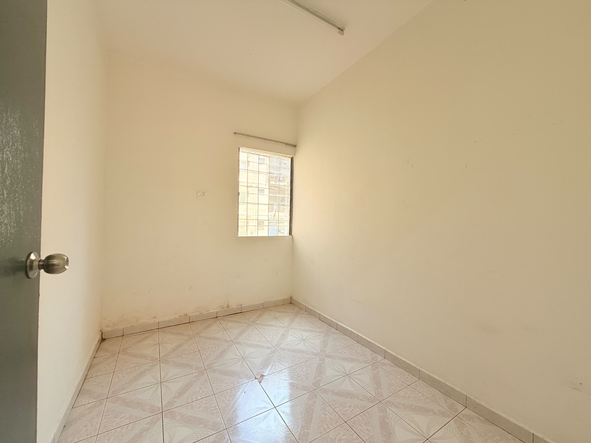 Second view of a bedroom at Telipok Ria Apartment